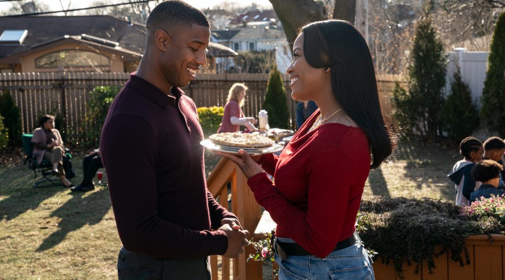 Charles Monroe King (Michael B. Jordan) and Dana Canedy (Chanté Adams) at a birthday barbecue in Columbia Pictures' A JOURNAL FOR JORDAN.