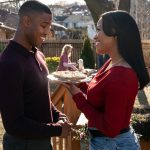 Charles Monroe King (Michael B. Jordan) and Dana Canedy (Chanté Adams) at a birthday barbecue in Columbia Pictures' A JOURNAL FOR JORDAN.