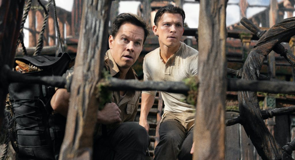 L-r: Mark Wahlberg and Tom Holland in "Uncharted." Courtesy Sony Pictures.