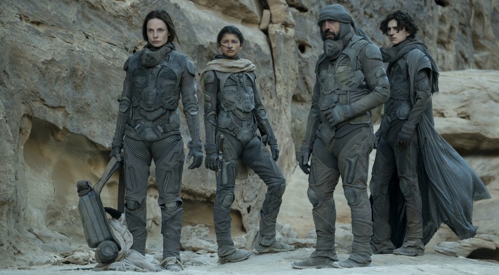 Caption: (L-r) REBECCA FERGUSON as Lady Jessica Atreides, ZENDAYA as Chani, JAVIER BARDEM as Stilgar, and TIMOTHÉE CHALAMET as Paul Atreides in Warner Bros. Pictures’ and Legendary Pictures’ action adventure “DUNE,” a Warner Bros. Pictures and Legendary release. Photo Credit: Chiabella James