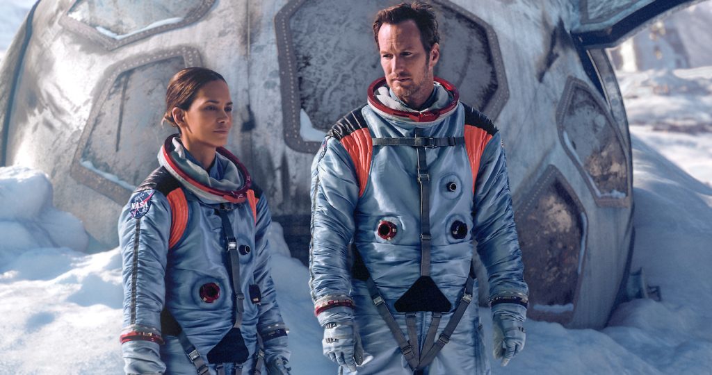 Halle Berry (Jocinda Fowler) and Patrick Wilson (Brian Harper) as stranded astronauts in "Moonfall." Photo credit: Reiner Bajo. Courtesy Lionsgate.