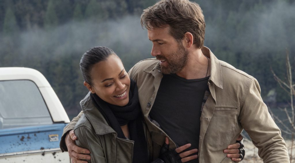 The Adam Project (L to R) Zoe Saldana as Laura and Ryan Reynolds as Big Adam. Cr. Doane Gregory/Netflix © 2021