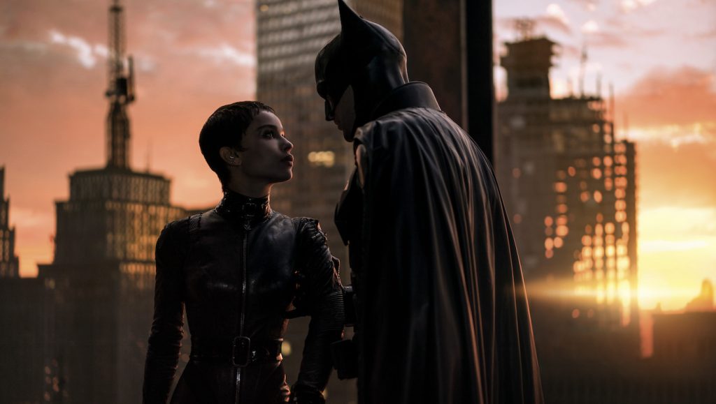 Caption: (L-r) ZOË KRAVITZ as Selina Kyle and ROBERT PATTINSON as Batman and in Warner Bros. Pictures’ action adventure “THE BATMAN,” a Warner Bros. Pictures release. Photo Credit: Jonathan Olley/™ & © DC Comics