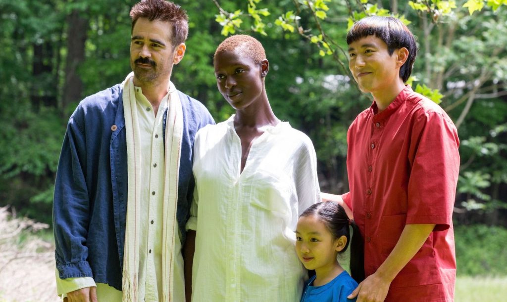 Colin Farrell is Jake, Jodie Turner-Smith is Kyra, Malea Emma Tjandrawidjaja is Mika and Justin H. Min is Yang in "After Yang." Courtesy A24