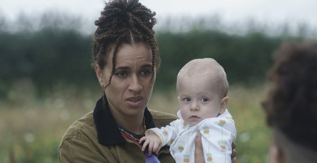 Michelle De Swarte and one of the Hill babies. Photograph by Ross Ferguson/HBO