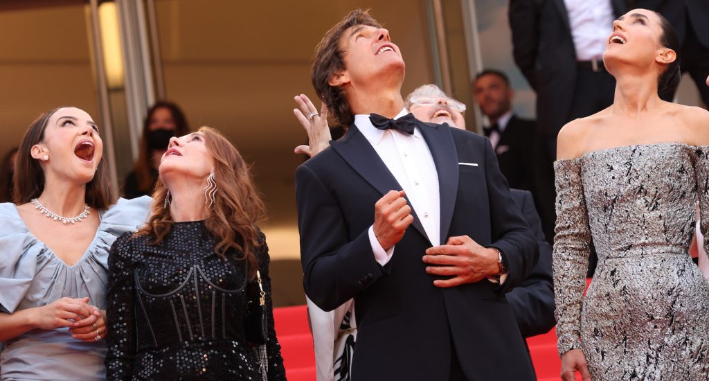 CANNES, FRANCE - MAY 18: Keleigh Sperry, Linda Bruckheimer, Tom Cruise and Jennifer Connelly attend the screening of "Top Gun: Maverick" during the 75th annual Cannes film festival at Palais des Festivals on May 18, 2022 in Cannes, France. (Photo by Vittorio Zunino Celotto/Getty Images)