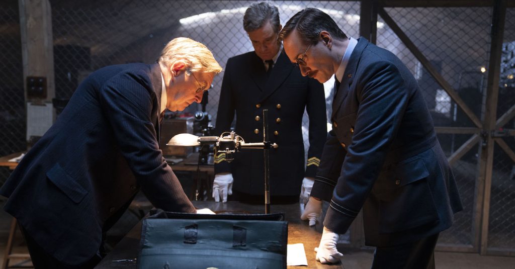 OPERATION MINCEMEAT (2022) James Fleet as Charles Fraser-Smith, Colin Firth as Ewen Montagu and Matthew Macfadyen as Charles Cholmondeley. Cr: Giles Keyte/Courtesy See-Saw Films and Netflix