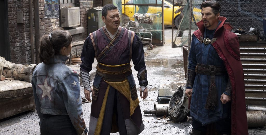 Xochitl Gomez as America Chavez, Benedict Wong as Wong, and Benedict Cumberbatch as Doctor Strange/Stephen Strange in Marvel Studios' DOCTOR STRANGE IN THE MULTIVERSE OF MADNESS. Photo by Jay Maidment. ©Marvel Studios 2022. All Rights Reserved.