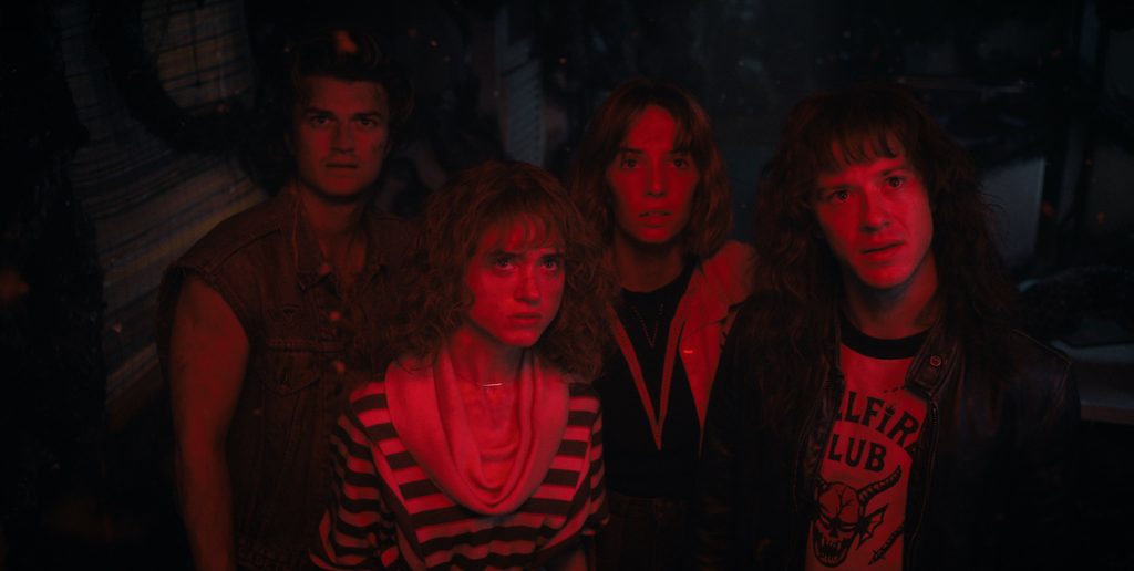 STRANGER THINGS. (L to R) Joe Keery as Steve Harrington, Natalia Dyer as Nancy Wheeler, Maya Hawke as Robin Buckley, and Joseph Quinn as Eddie Munson in STRANGER THINGS. Cr. Courtesy of Netflix © 2022