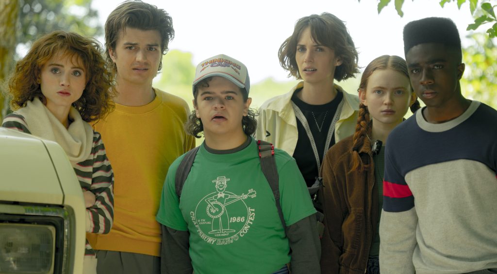 STRANGER THINGS. (L to R) Natalia Dyer as Nancy Wheeler, Joe Keery as Steve Harrington, Gaten Matarazzo as Dustin Henderson, Maya Hawke as Robin Buckley, Sadie Sink as Max Mayfield, and Caleb McLaughlin as Lucas Sinclair in STRANGER THINGS. Cr. Tina Rowden/Netflix © 2022