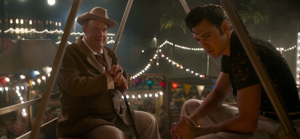 Caption: (L-r) TOM HANKS as Colonel Tom Parker and AUSTIN BUTLER as Elvis in Warner Bros. Pictures’ drama “ELVIS,” a Warner Bros. Pictures release. Photo Credit: Courtesy of Warner Bros. Pictures