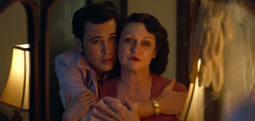  Caption: (L-r) AUSTIN BUTLER as Elvis and HELEN THOMSON as Gladys in Warner Bros. Pictures’ drama “ELVIS,” a Warner Bros. Pictures release. Photo Credit: Courtesy of Warner Bros. Pictures