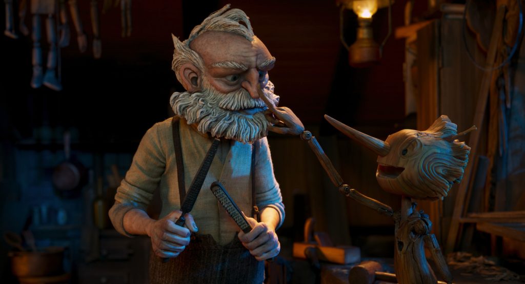 Guillermo del Toro's Pinocchio - (L-R) Gepetto (voiced by David Bradley) and Pinocchio (voiced by Gregory Mann). Cr: Netflix © 2022