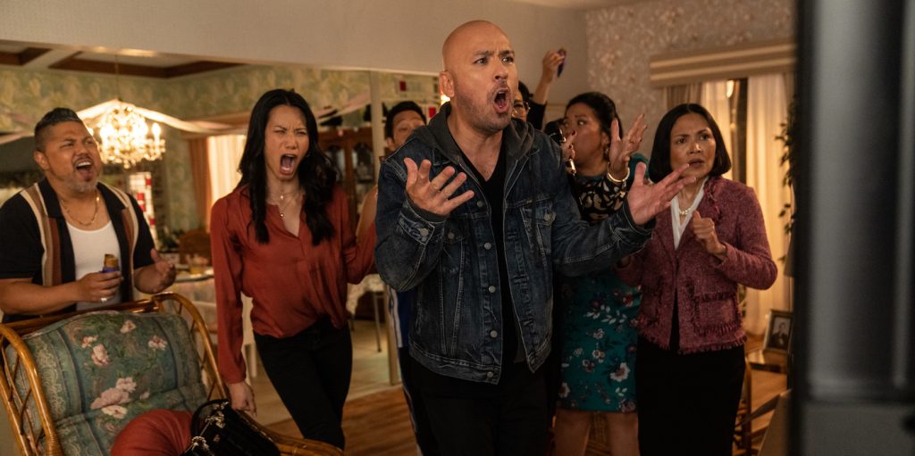 (from left) Tito Manny (Joey Guila), Regina (Elena Juatco), Eugene (Eugene Cordero), Joe Valencia (Jo Koy), Tita Teresa (Tia Carrere), Tita Yvonne (Melody Butiu) and Susan (Lydia Gaston) in Easter Sunday, directed by Jay Chandrasekhar.