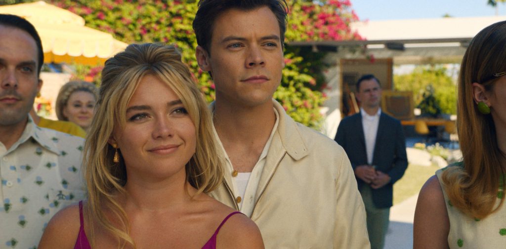 Caption: (L-R) FLORENCE PUGH as Alice and HARRY STYLES as Jack in New Line Cinema’s “DON’T WORRY DARLING,” a Warner Bros. Pictures release. Photo Credit: Courtesy of Warner Bros. Pictures