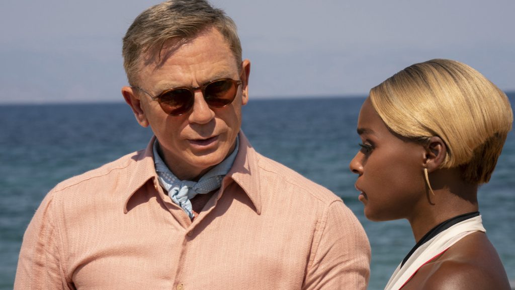 GLASS ONION: A KNIVES OUT MYSTERY (2022) Daniel Craig as Detective Benoit Blanc and Janelle Monáe as Andi. Cr: John Wilson/NETFLIX