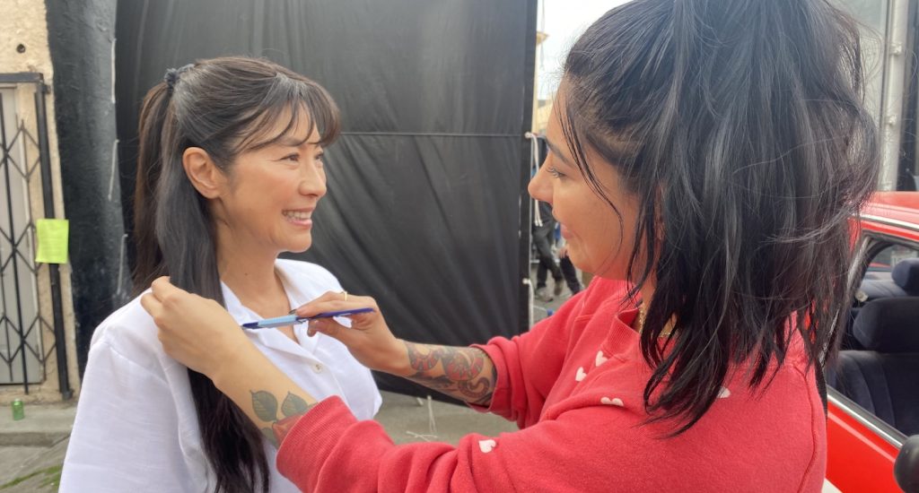 L-r: Michelle Yeoh and Hair Department Head Anissa E. Salazar. Courtesy A24.