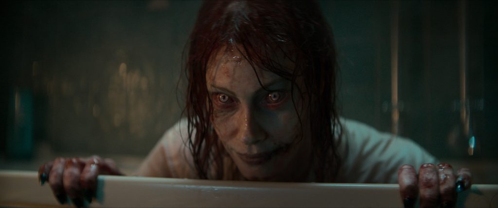 Caption: ALYSSA SUTHERLAND as Ellie in New Line Cinema’s horror film “EVIL DEAD RISE,” a Warner Bros. Pictures release. Photo Credit: Courtesy of Warner Bros. Pictures