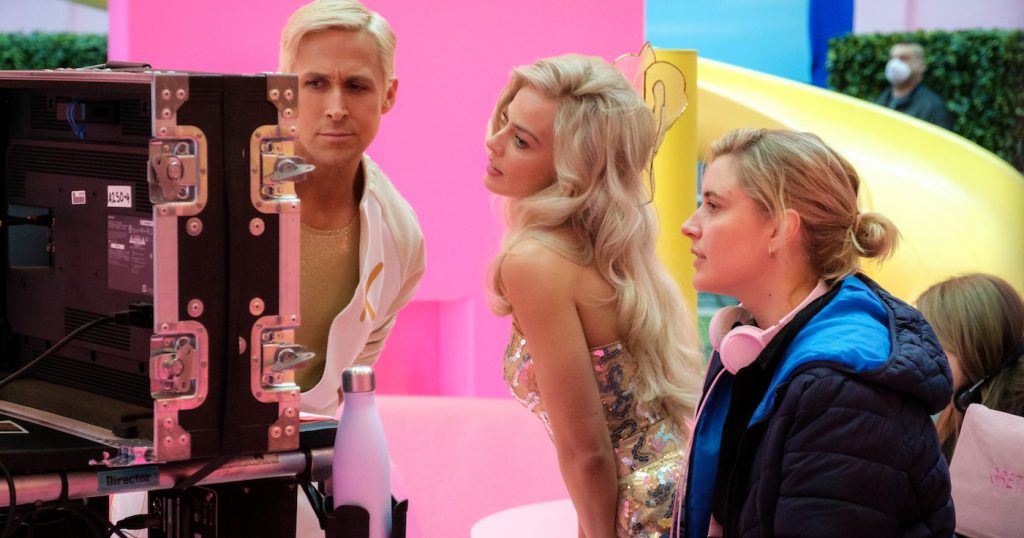 Caption: (L-r) RYAN GOSLING, MARGOT ROBBIE and Director/Writer GRETA GERWIG on the set of Warner Bros. Pictures’ “BARBIE,” a Warner Bros. Pictures release. Photo Credit: Jaap Buitendijk